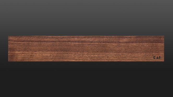 
                    The magnetic strip walnut hold up to six knives